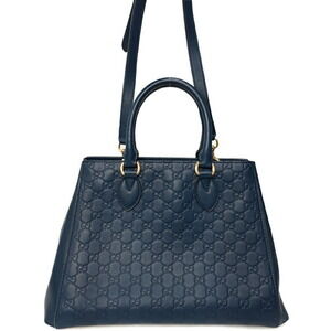 Gucci Guccissima leather top handle bag embossed monogram Black